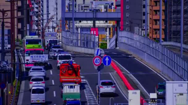 Un timelapse di paesaggio urbano a Yamanote avenue a Tokyo lungo tiro tilt — Video Stock