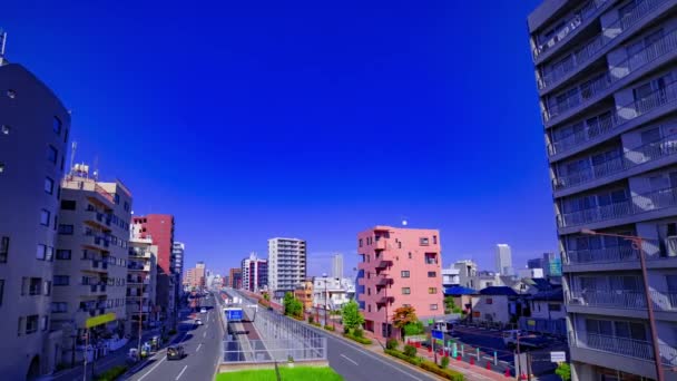 Un timelapse di paesaggio urbano a Yamanote avenue a Tokyo panning ampio colpo — Video Stock
