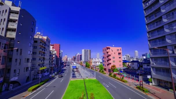 Een timelapse van stedelijk stadsgezicht op Yamanote avenue in Tokio wijd shot zoom — Stockvideo