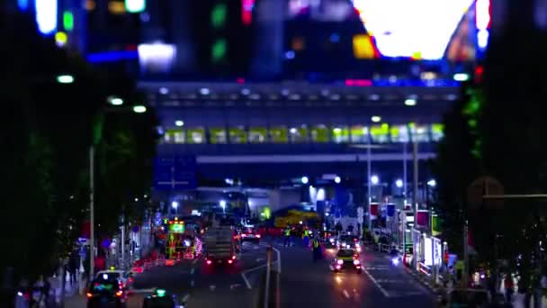 En natt timelapse av miniatyr urban city street i Shibuya Tokyo tiltshift lutande — Stockvideo