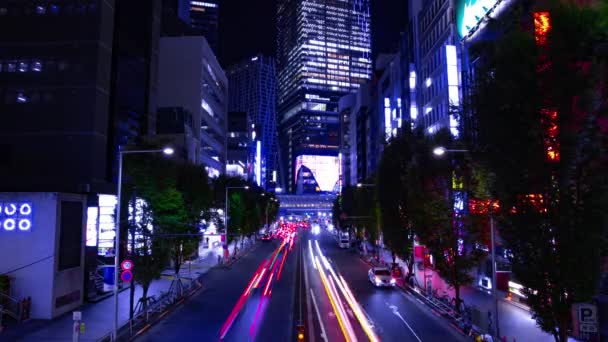 En natt timelapse av stadens gata i Shibuya Tokyo bred skott — Stockvideo