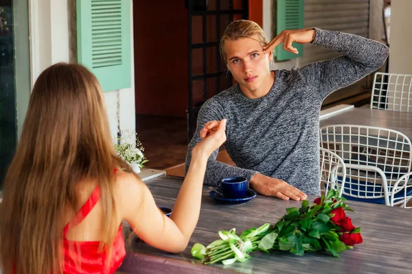 first date spending time together ignoring real communication bored conversation disappoint couple in restaurant, bad relationship Young bored girl and male sitting on date at cafe. Speed dating