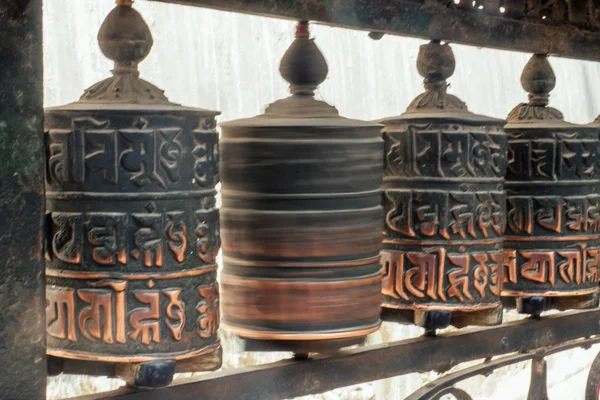 Tibetan wooden drums with prayers. concept of tourism and religion. Nepal Himalayas Stock Photo