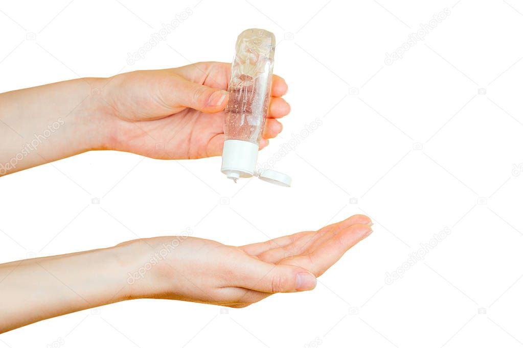Human hands use a gel, disinfectant, antiseptic in a bubble, jar on a black background isolated