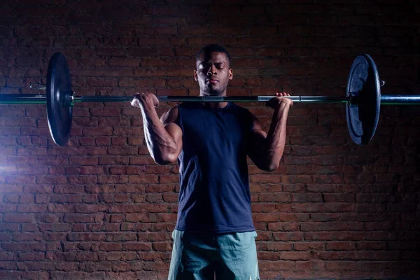 African american man with dumbbell weight training equipment gym — Stok Foto