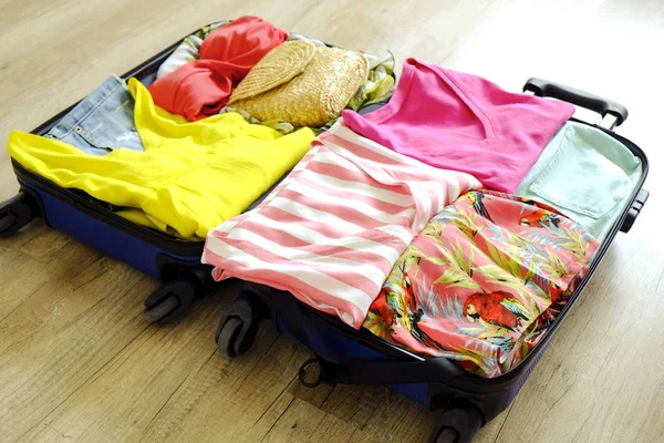 Open Suitcase Fully Packed Folded Women Clothing Accessories Floor Woman — Stock Photo, Image