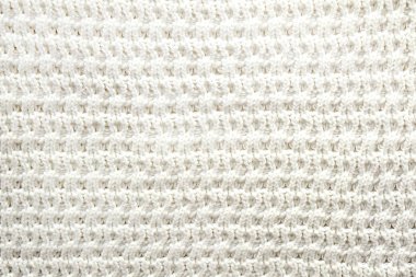 Sorunsuz yün örgü modeli sonbaharın atış kadar yakın kırpılmış / kış sezon kazak, şık hipster Triko giyim açıkça görünür lif dokusuna sıcak. Arka plan, kopya alanı, üstten görünüm.