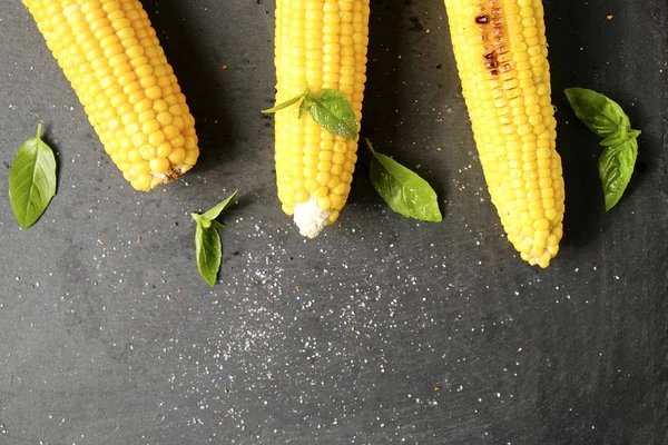 Three Cobs Corn Grilled Barbecue Fire Laid Green Basil Leaves — Stock Photo, Image