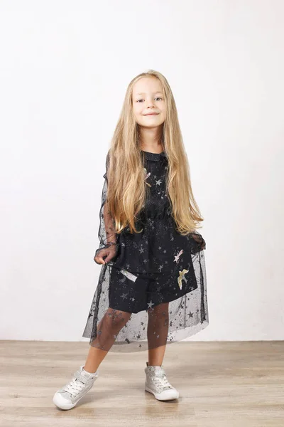 Little Blonde Girl Long Golden Hair Wearing Black Dress Stars — Stock Photo, Image