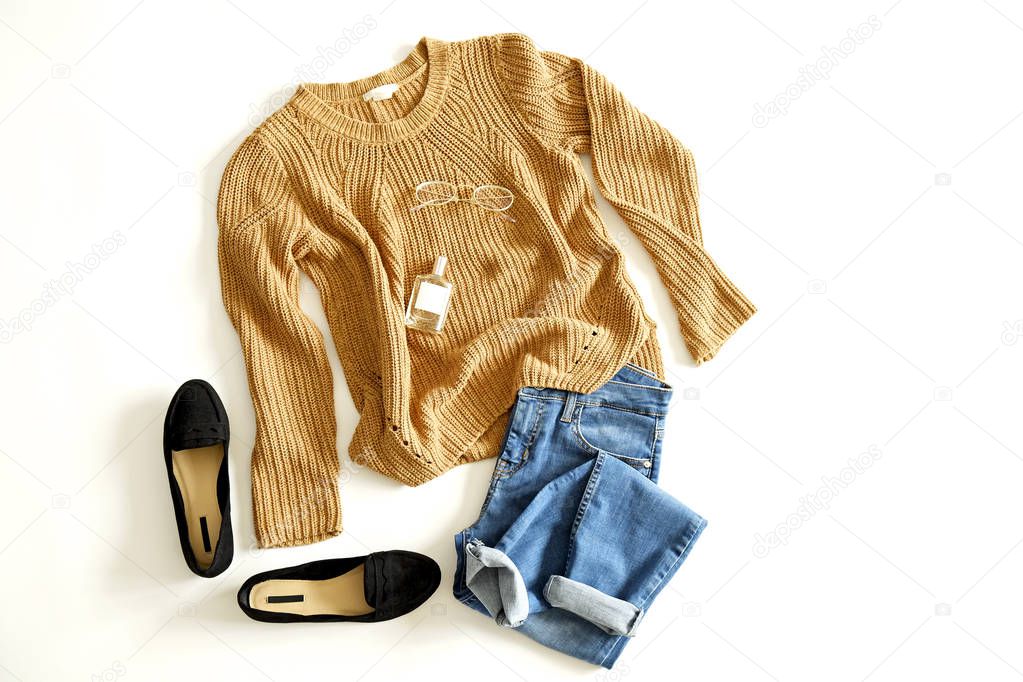 Autumn clothing essentials ideas for fashion blog look book showcase. Casual set of matching garment items. Trendy mass market apparel concept. Background, copy space, close up, top view, flat lay.