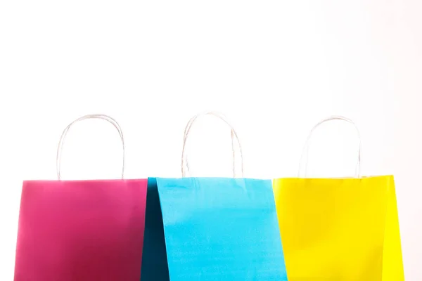 Many Blank Paper Shopping Bags Different Colors Pink Blue Yellow — Stock Photo, Image