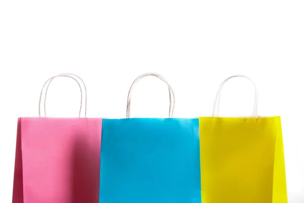 Many Blank Paper Shopping Bags Different Colors Pink Blue Yellow — Stock Photo, Image