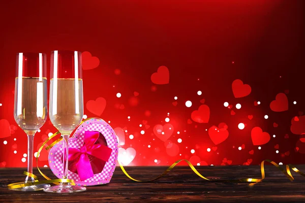 Conceptual Image Two Champagne Flute Glasses Red Heart Shaped Bokeh — Stock Photo, Image