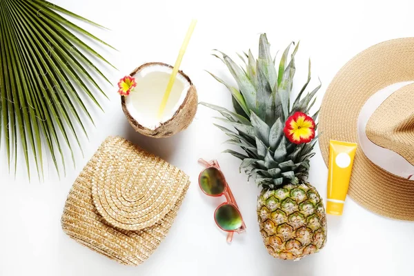 Exotic top view composition with items symbolizing summer mood.