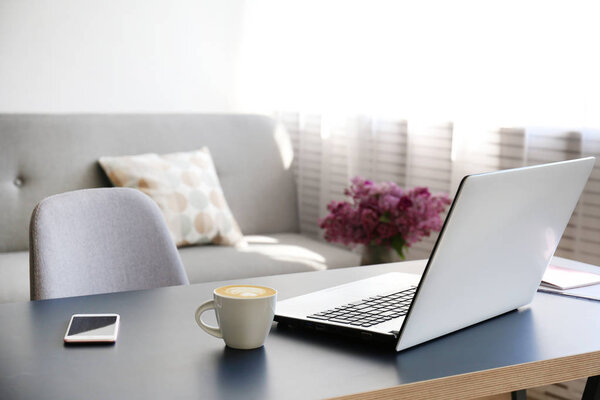 Minimalistic interior style office space in bright natural daylight.