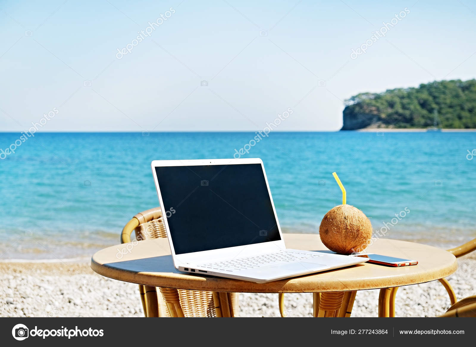 Office on the beach concept. Stock Photo by ©evrmmnt 277243864