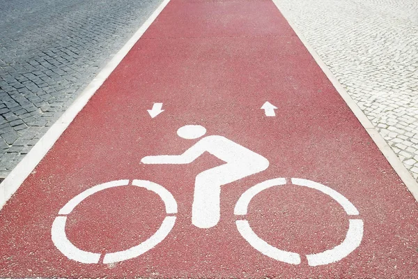 Bike lane stencil sign.