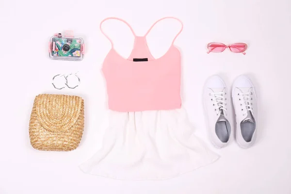 Clothing items laying on white background. — Stock Photo, Image