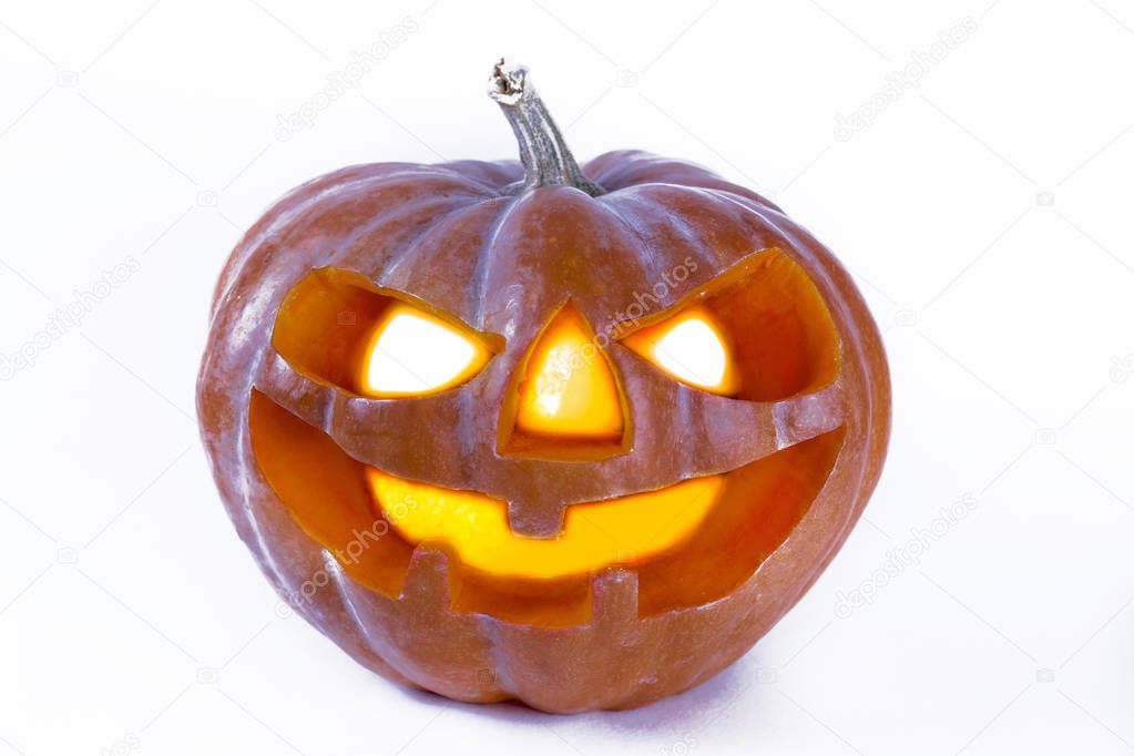 Jack-O-Lantern pumpking with light inside for all hallows eve. Halloween background.
