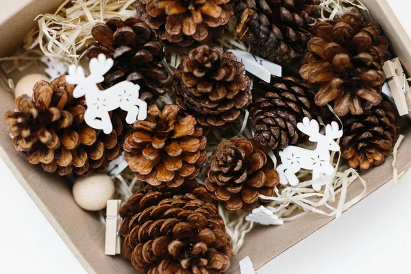 Set Pinecones Craft Box Wood Shavings White Wooden Decor Holiday — Stock Photo, Image