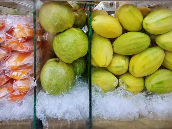 Various Kinds Tropical Fruits Glass Container Partitions Ice — Stock Photo, Image