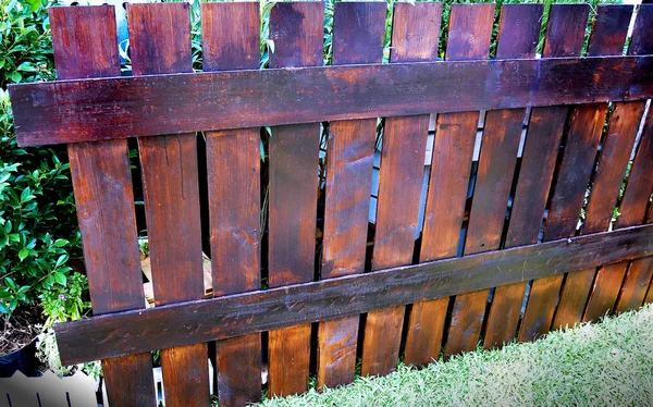 Old Fence made of Wooden Planks
