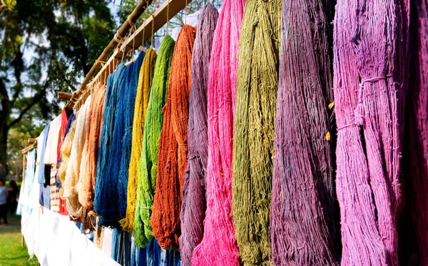 Colorful Raw Cottons Hanging in Sunlight