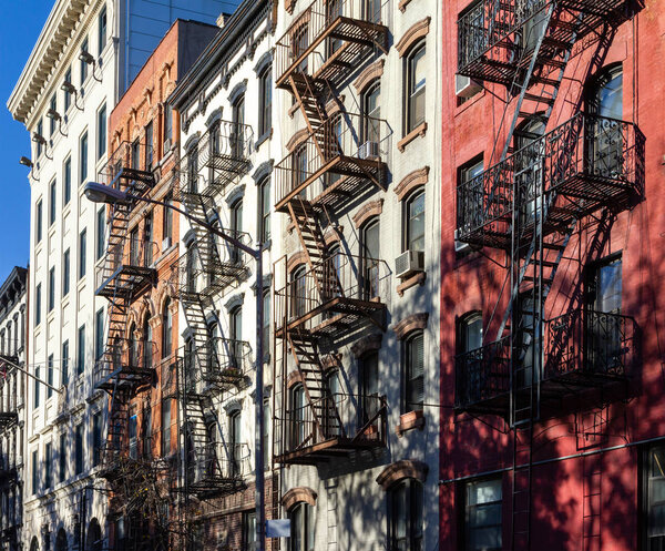 Block of old historic buildings on 5th Street in the East Village neighborhood of Manhattan in New York City NYC