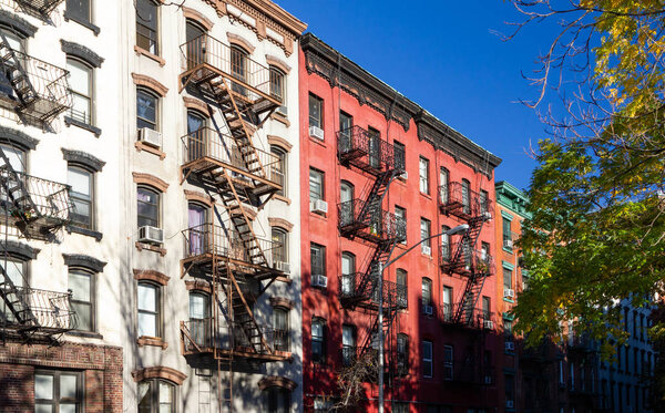 Row of colorful old apartment buildings in the East Village neighborhood of Manhattan in New York City