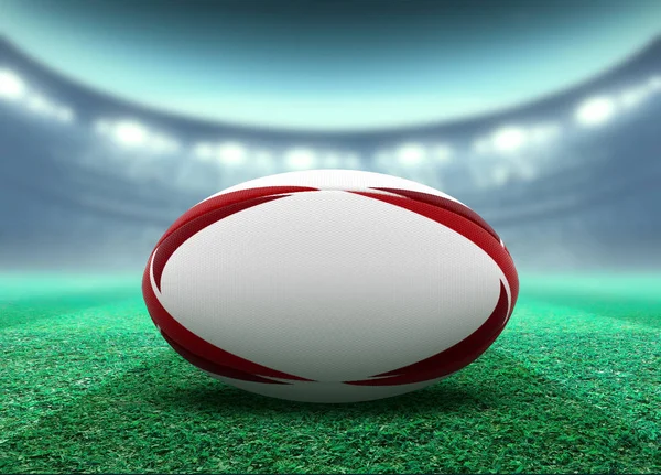Estadio iluminado y pelota de rugby —  Fotos de Stock
