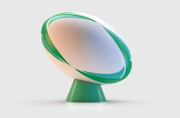 Зеленый и белый регбийный мяч — стоковое фото