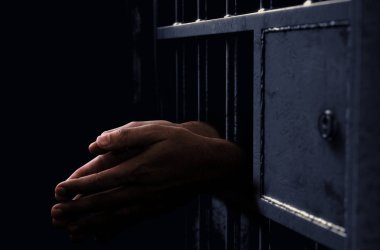 Jail Cell And Black Hands clipart