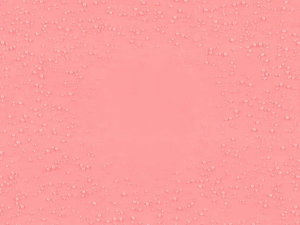 Gotita de agua en superficie texturizada rosa —  Fotos de Stock