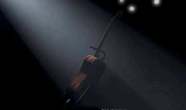 Акустическая Гитара Лежащая Трибуне Сцене Музыкального Концерта Освещенная Одним Драматическим — стоковое фото