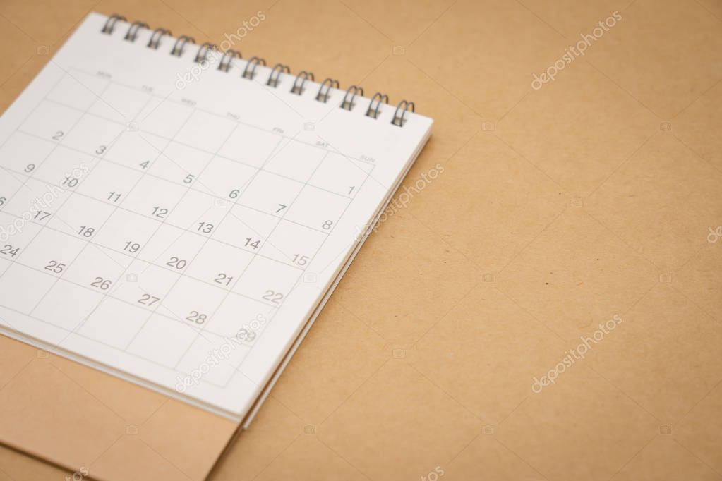 A calendar of the month. using as background business concept an