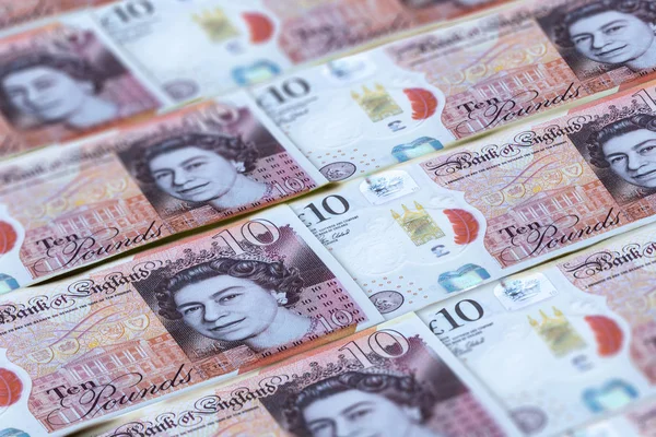 Hintergrund sind britische Pfund-Banknoten. Vereinigtes Königreich — Stockfoto