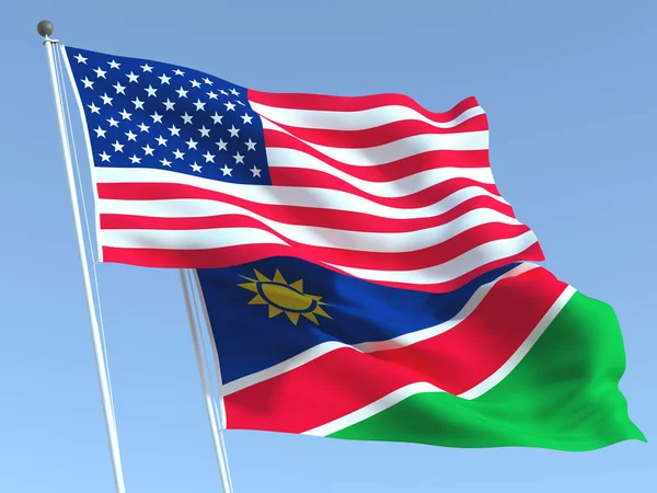 Zwei Schwenkende Flaggen Der Vereinigten Staaten Und Namibias Blauen Himmel — Stockfoto