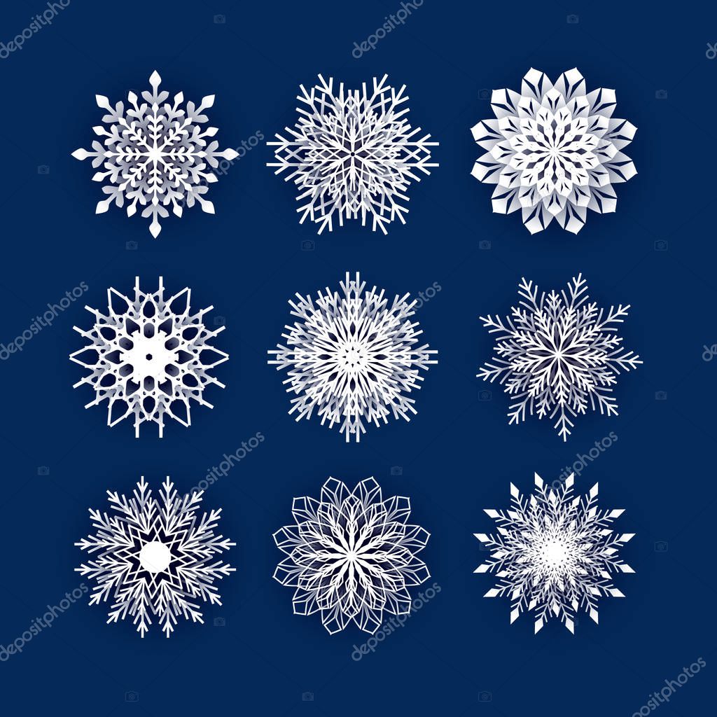 Set of 3d snowflakes vector image. Winter collection white isolated icon with shadow on blue background. Vector crystal papercut element.