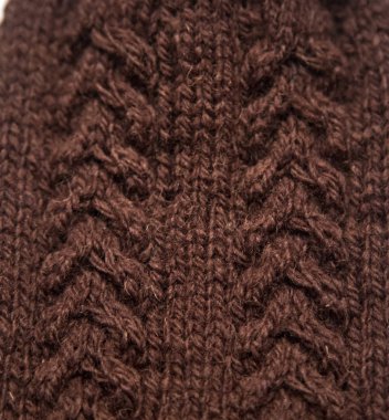 Sıcak bir örgü deseni güzel bir portre. Doğal koyun yün iplik. Parlak renklerde elişi.