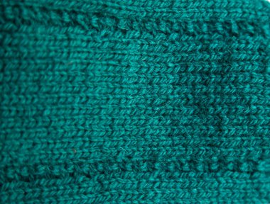 Sıcak bir örgü deseni güzel bir portre. Doğal koyun yün iplik. Parlak renklerde elişi.