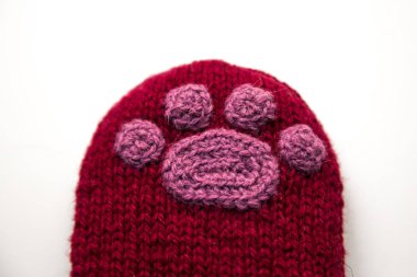 Güzel bir closeup od örme yün tığ işi hayvan pençe desen ile çorap..