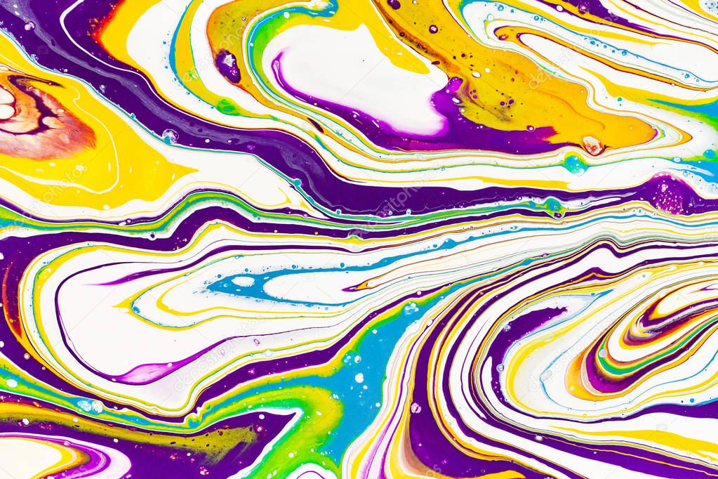 Acrylic paint waves abstract background. Rainbow marble texture. Oil paint liquid flow colorful wallpaper. Creative violet, yellow, blue fluid effect backdrop.