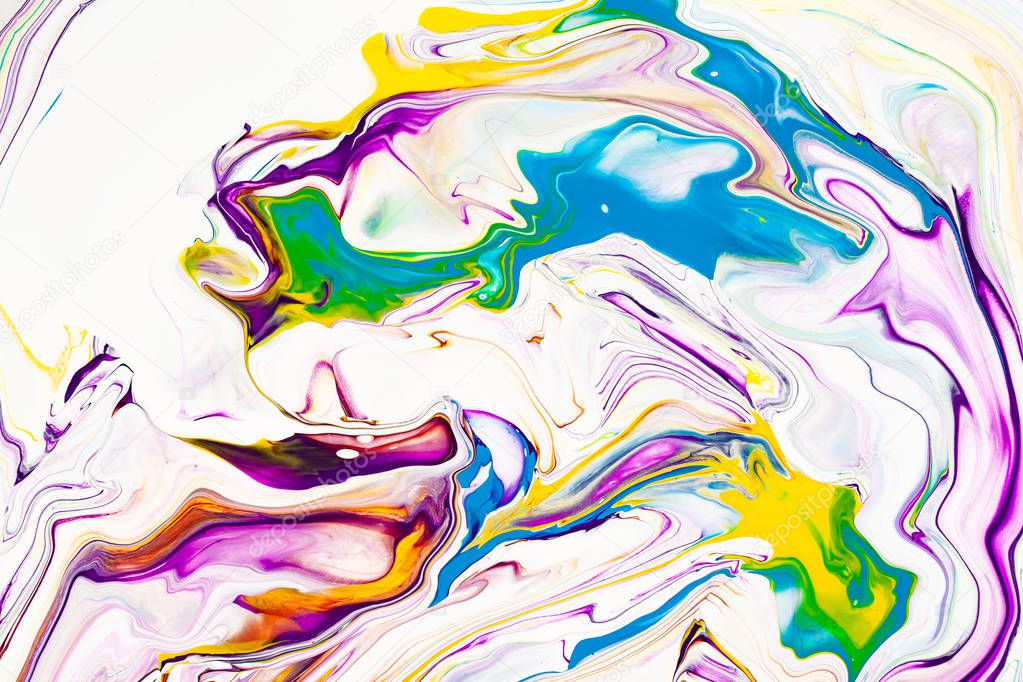 Oil paint mix abstract background. Rainbow marble texture. Acrylic liquid flow colorful wallpaper. Creative violet, yellow, blue paint swirls, waves. Multicolor watercolor pattern, fluid effect.