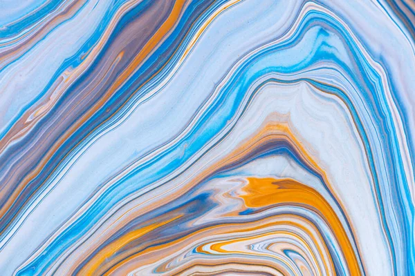 Fluid art texture. Abstract background with swirling paint effect. Liquid acrylic picture with chaotic mixed paints. Can be used for posters or wallpapers. Blue , orange and azure overflowing colors.