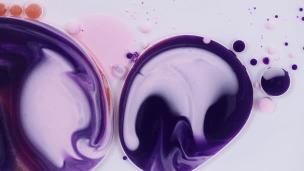Fluid art painting footage, abstract acrylic texture with flowing effect. Liquid paint mixing artwork with waves and swirl. Detailed background motion lavender, purple and golden overflowing colors. — Stock Video