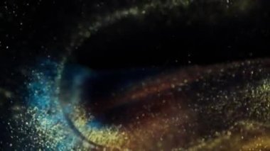 Festive Bokeh 'in arka plan videosu. Soyut parlayan zemin, hareket halindeki daireler. Yanıp sönen sıvı parçacıkların olduğu bir görüntü. Bulanık efektli altın, mavi ve yeşil renkli animasyon.