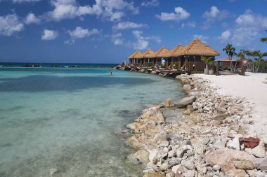 Cabanas on  Renaissance Island in Aruba clipart