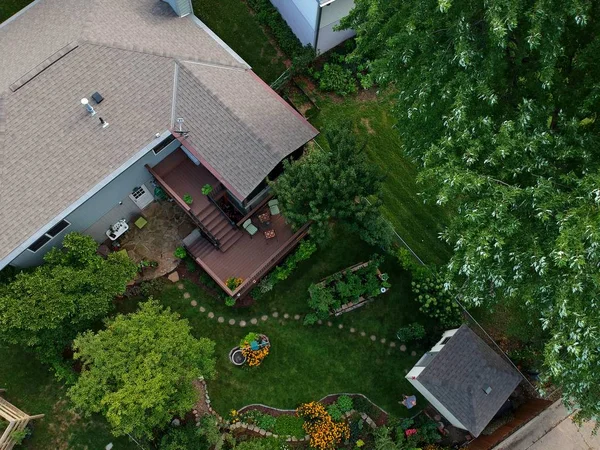 View of a new composite deck and sun room addition