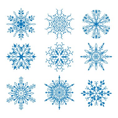 Beyaz arka plan üzerinde izole mavi kar taneleri kümesi