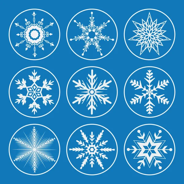 Set Witte Sneeuwvlokken Blauwe Achtergrond — Stockvector
